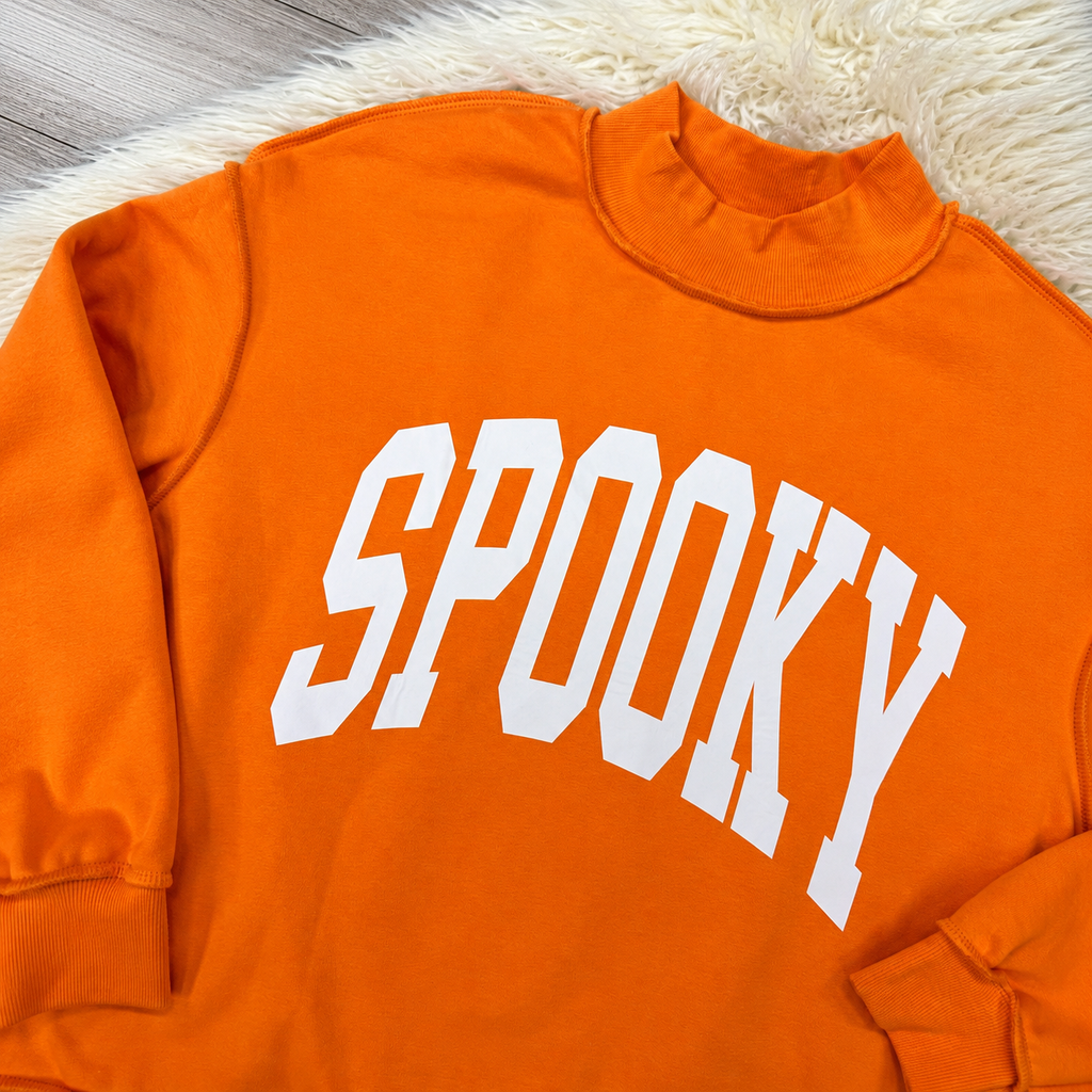 Spooky Boo Reversible Women’s Mock Neck Sweater by Evermmee