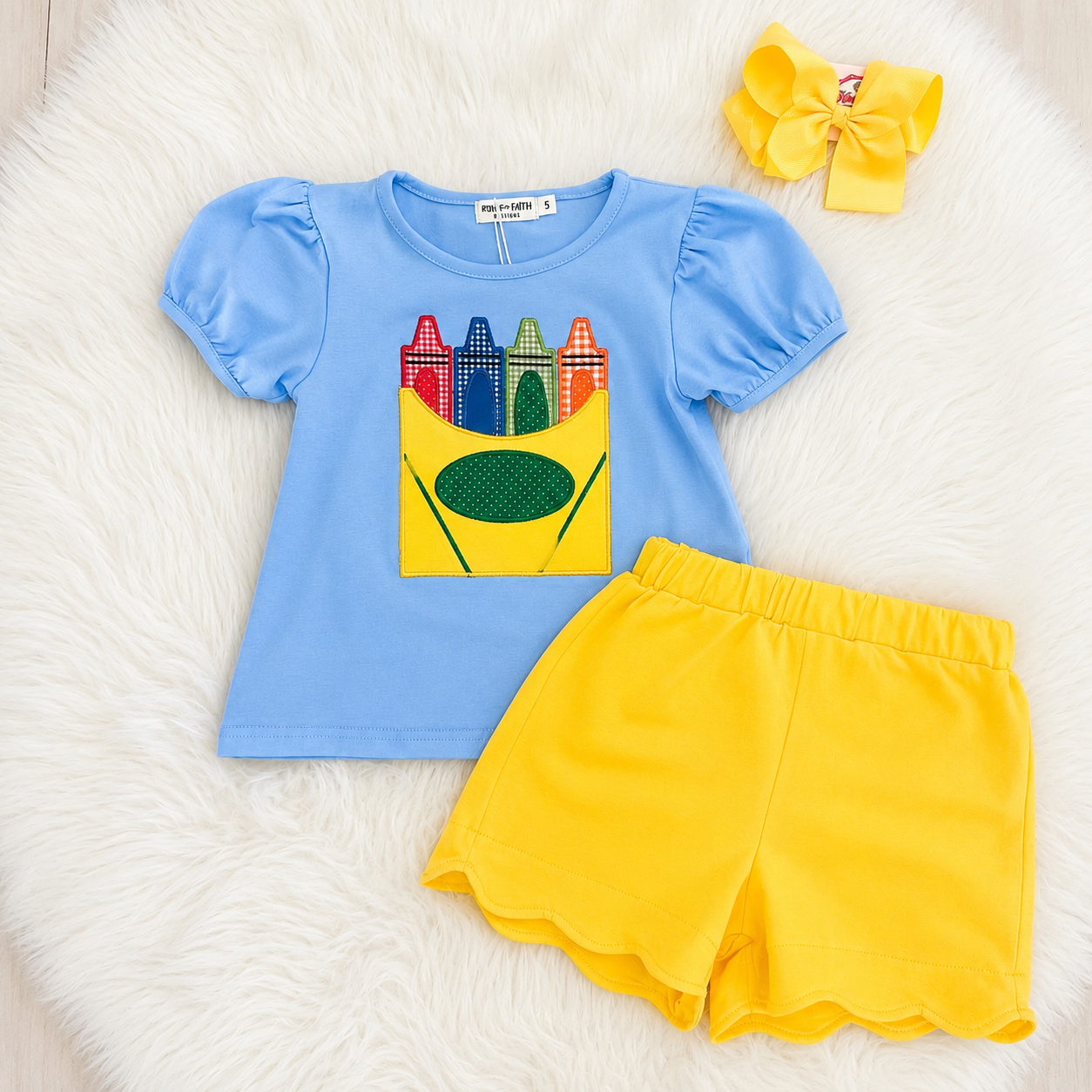 Girl’s blue and yellow crayon box set