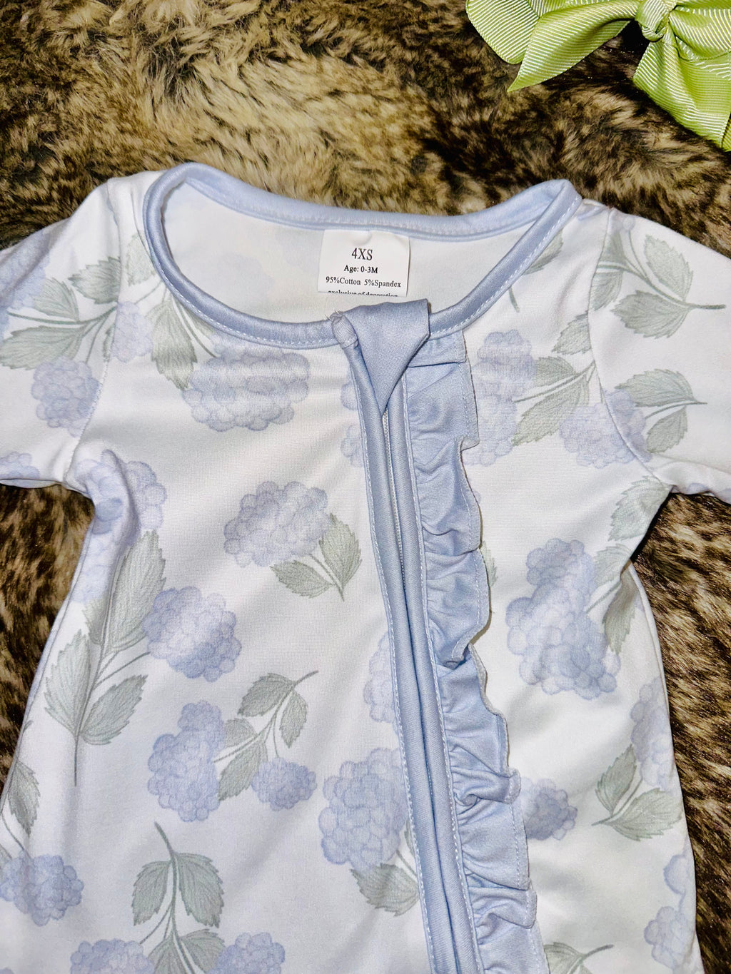 Girl’s muted blue and green hydrangea sleeper
