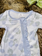 Girl’s muted blue and green hydrangea sleeper