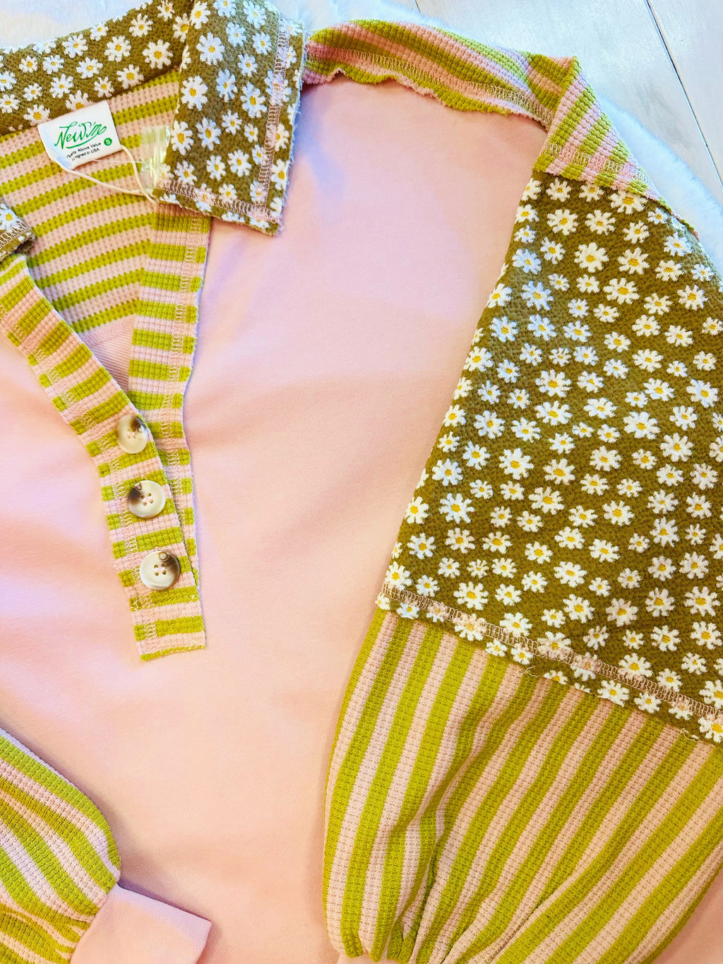 Women’s pink and green floral collared top