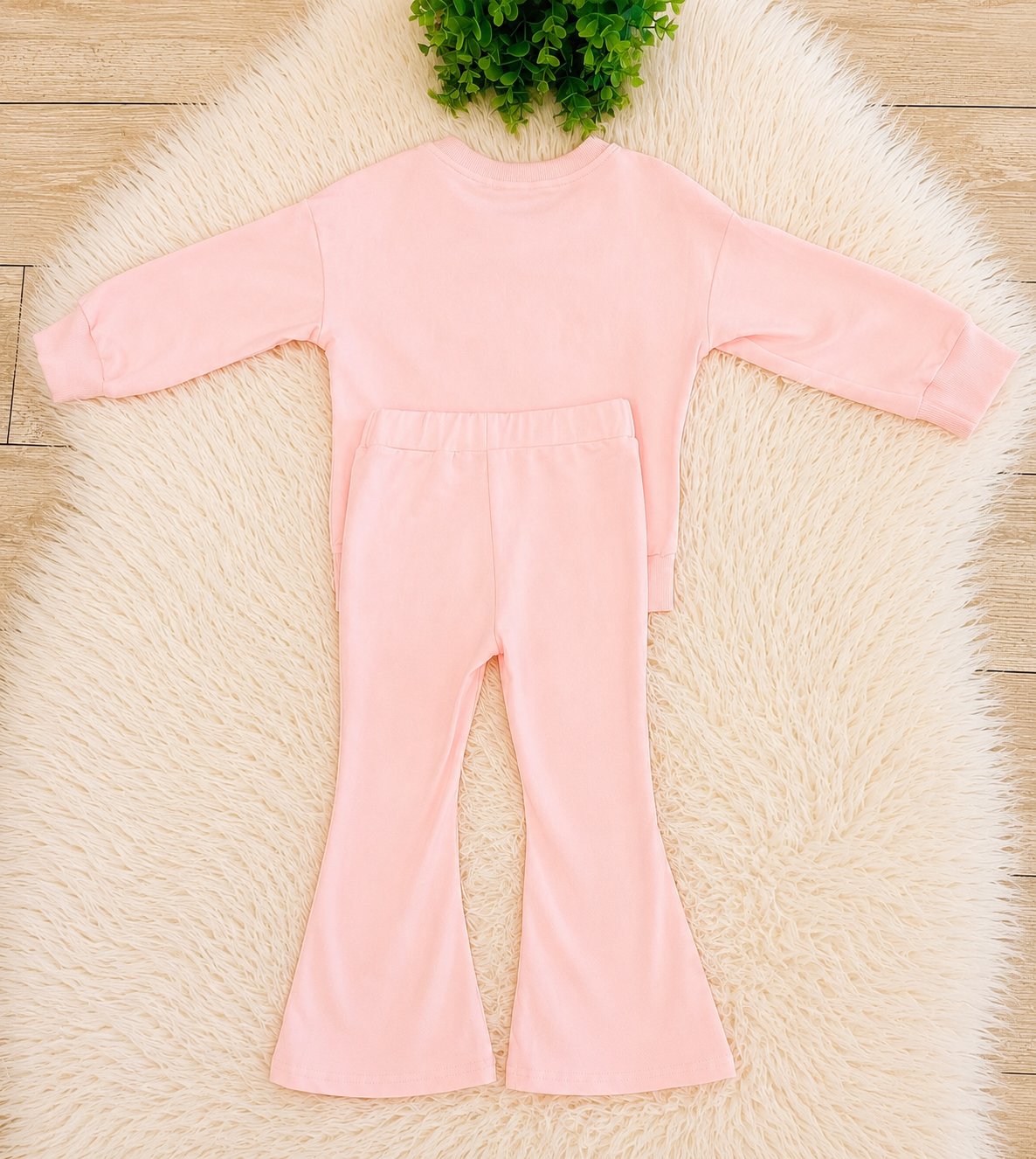 Girl’s Light Pink Outfit with Bow on Sweater