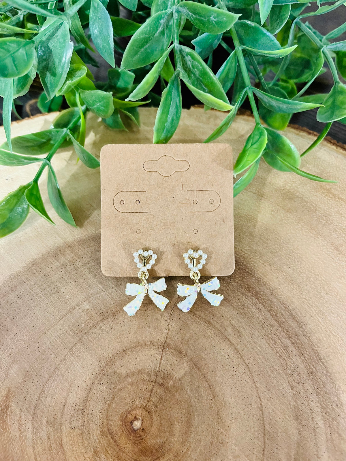 Women’s Diamond Heart Outline and White Glitter Bow Clip-On Earrings