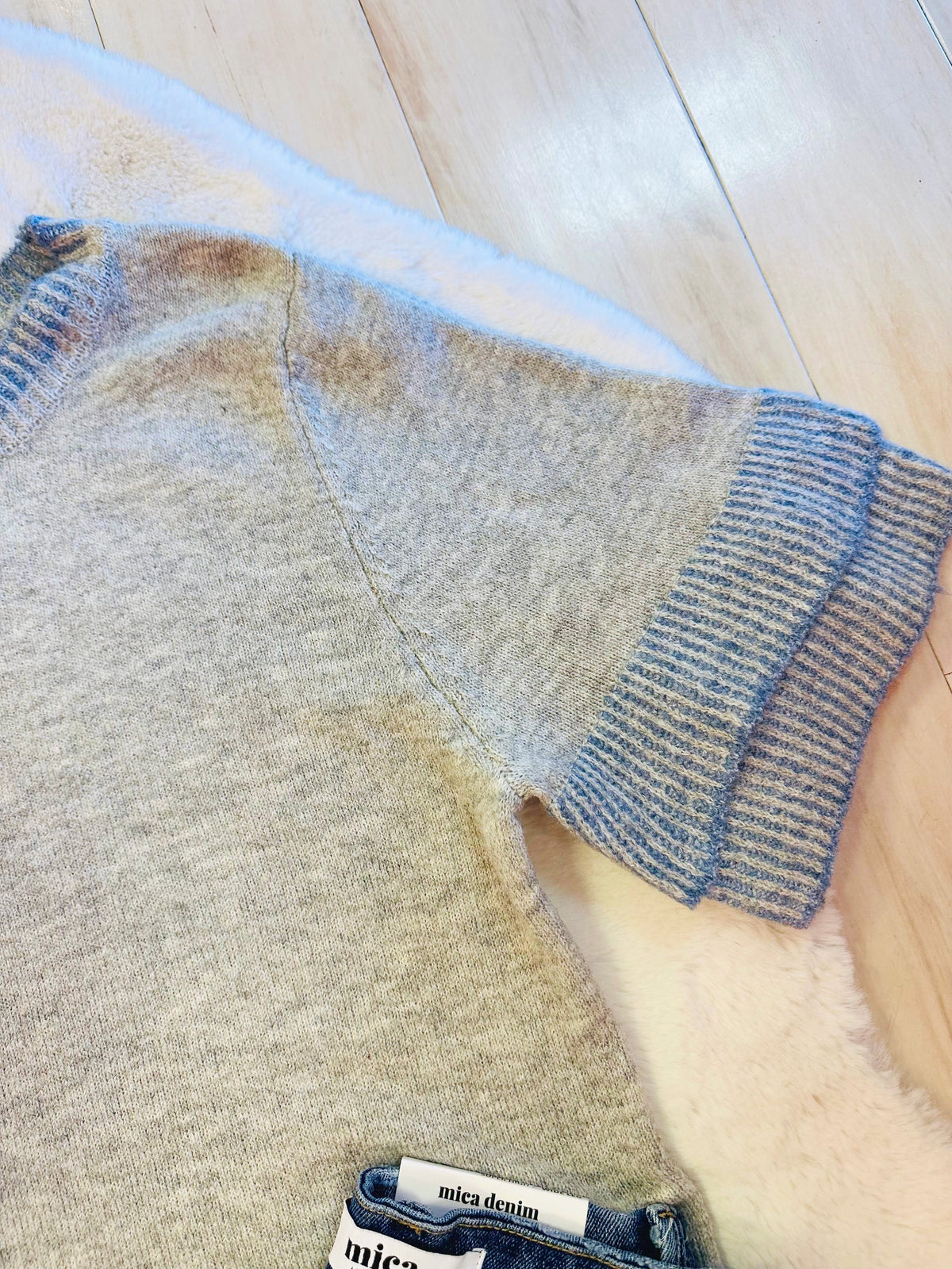 Women’s grey sweater top with blue detail-true to size