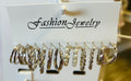 Women’s Silver Toned Twisted Hoops Earrings