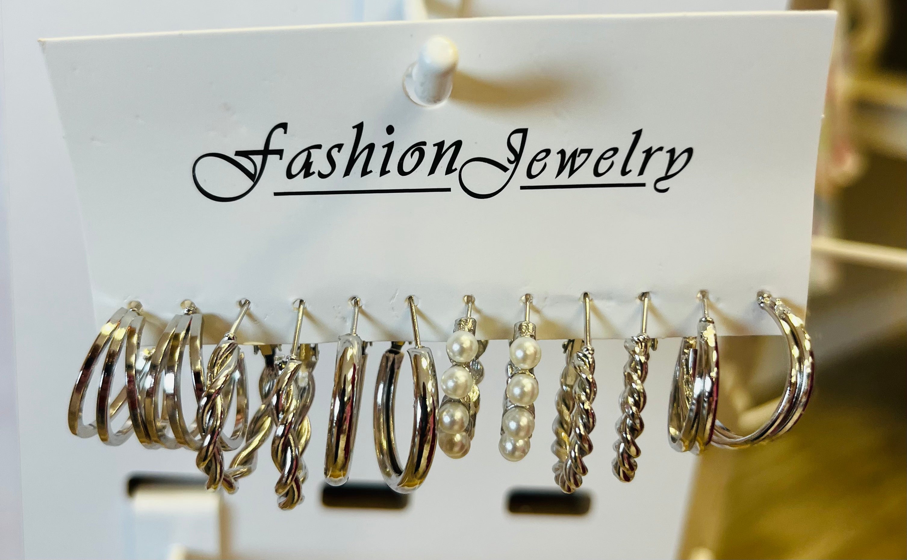 Women’s Silver Toned Twisted Hoops Earrings