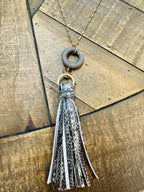 Women’s Gold and Snaked Skin Frizzled Necklace and Earrings