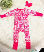 Girl’s dark pink bow sleeper