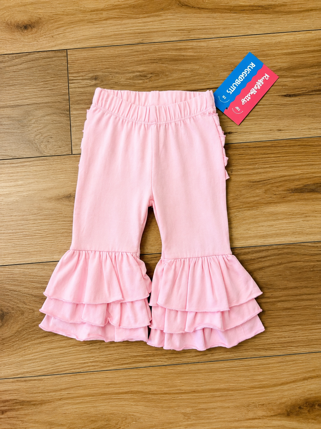Girl’s Pink Ruffle Bottom Pants by RuffleButts