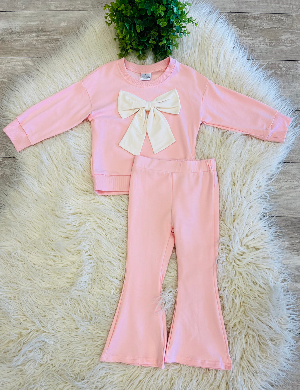 Girl’s Light Pink Outfit with Bow on Sweater