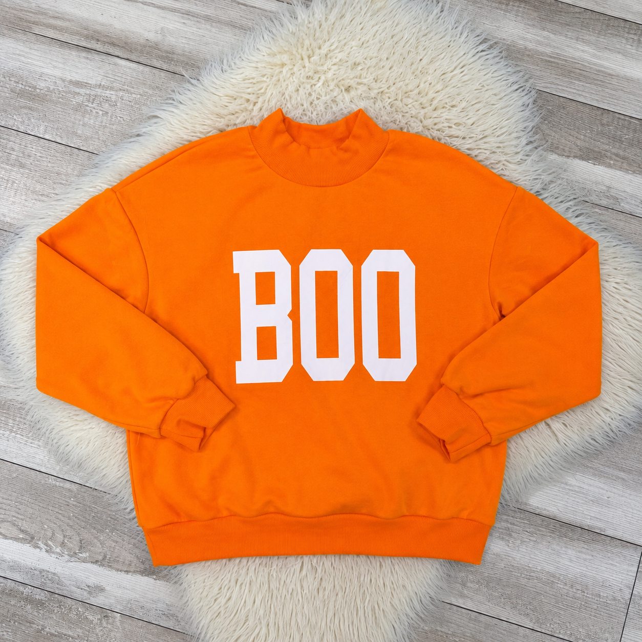 Spooky Boo Reversible Women’s Mock Neck Sweater by Evermmee