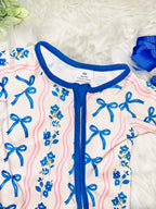 Girl’s pink and blue bow and floral sleeper