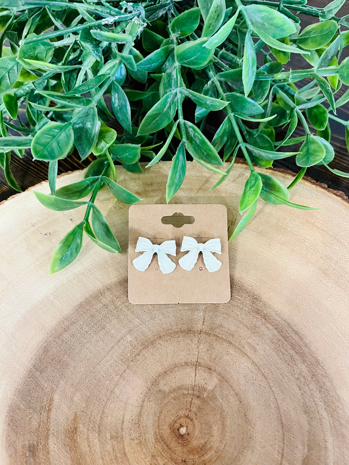 Women’s White Clay Bow Shaped Stud Earrings