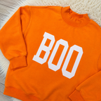 Spooky Boo Reversible Women’s Mock Neck Sweater by Evermmee