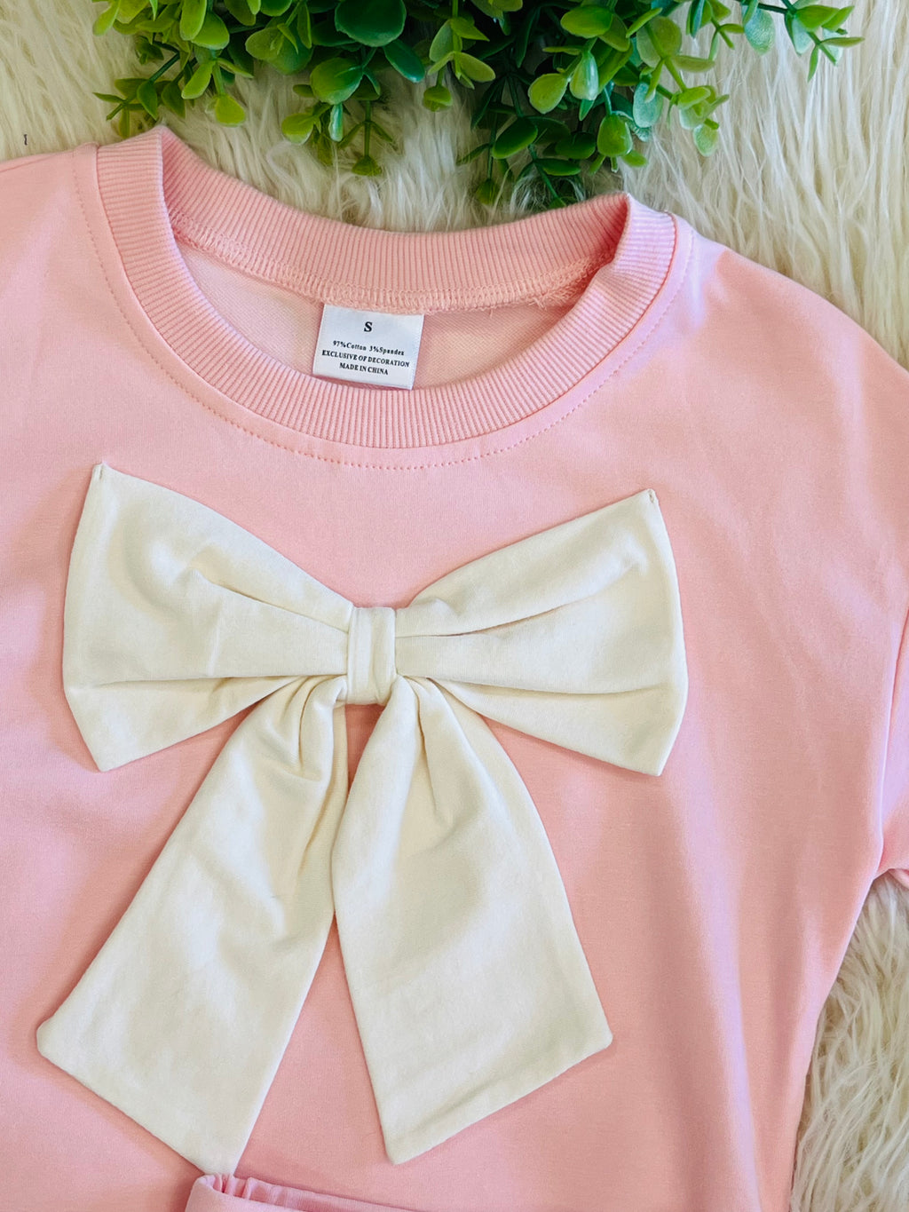 Girl’s Light Pink Outfit with Bow on Sweater