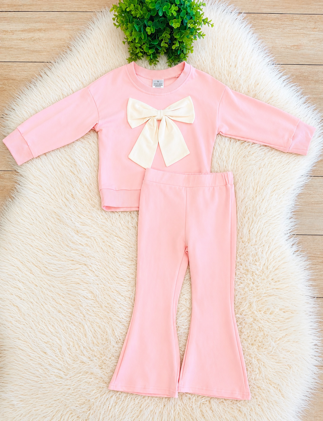 Girl’s Light Pink Outfit with Bow on Sweater