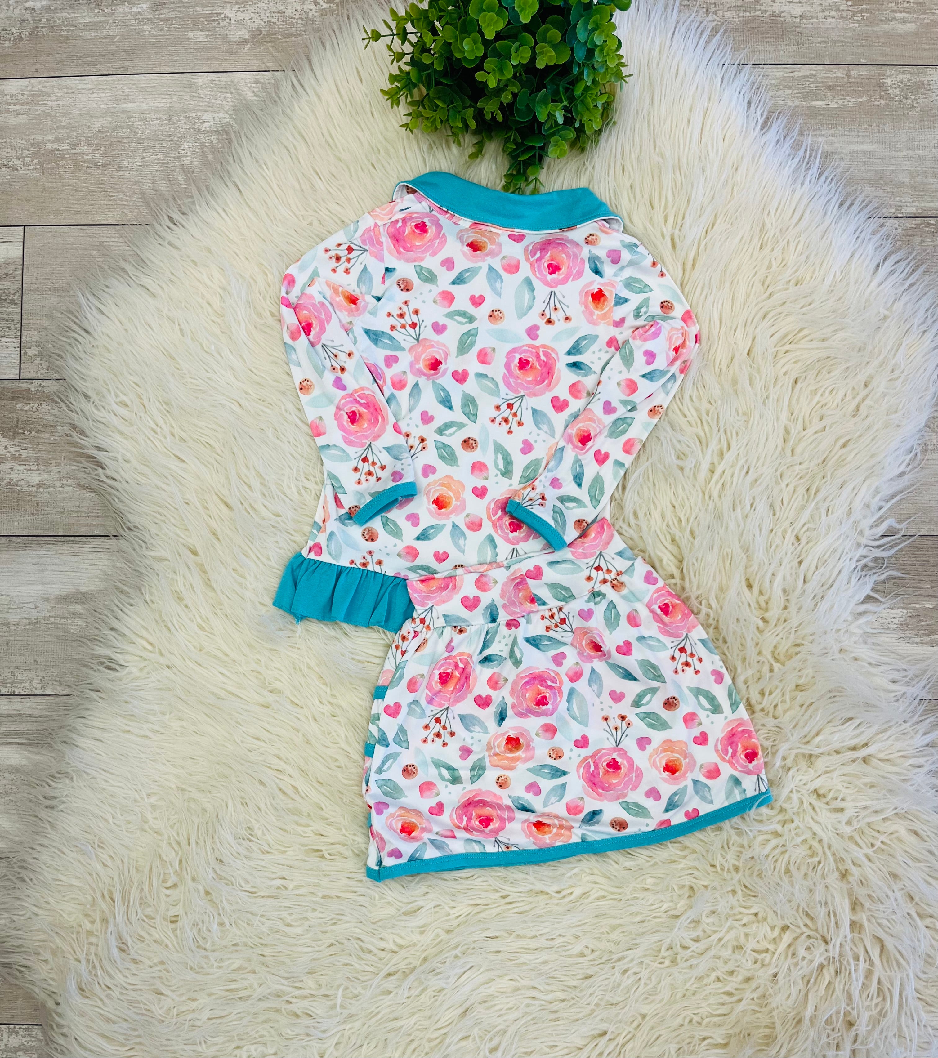 Girl’s Teal Floral Ruffle Quarter Zip Skort Outfit