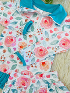 Girl’s Teal Floral Ruffle Quarter Zip Skort Outfit