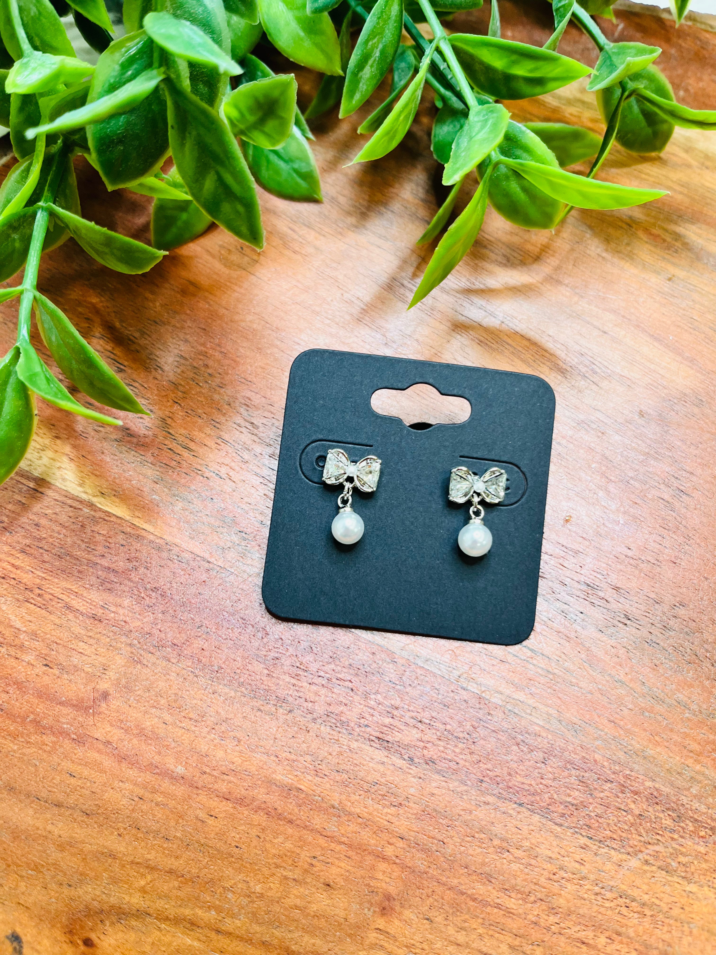 Women’s Silver Dipped Diamond Bow Earrings