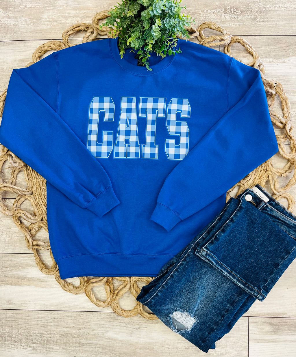 Women’s Royal Blue Crewneck Features blue-and-white gingham “CATS”