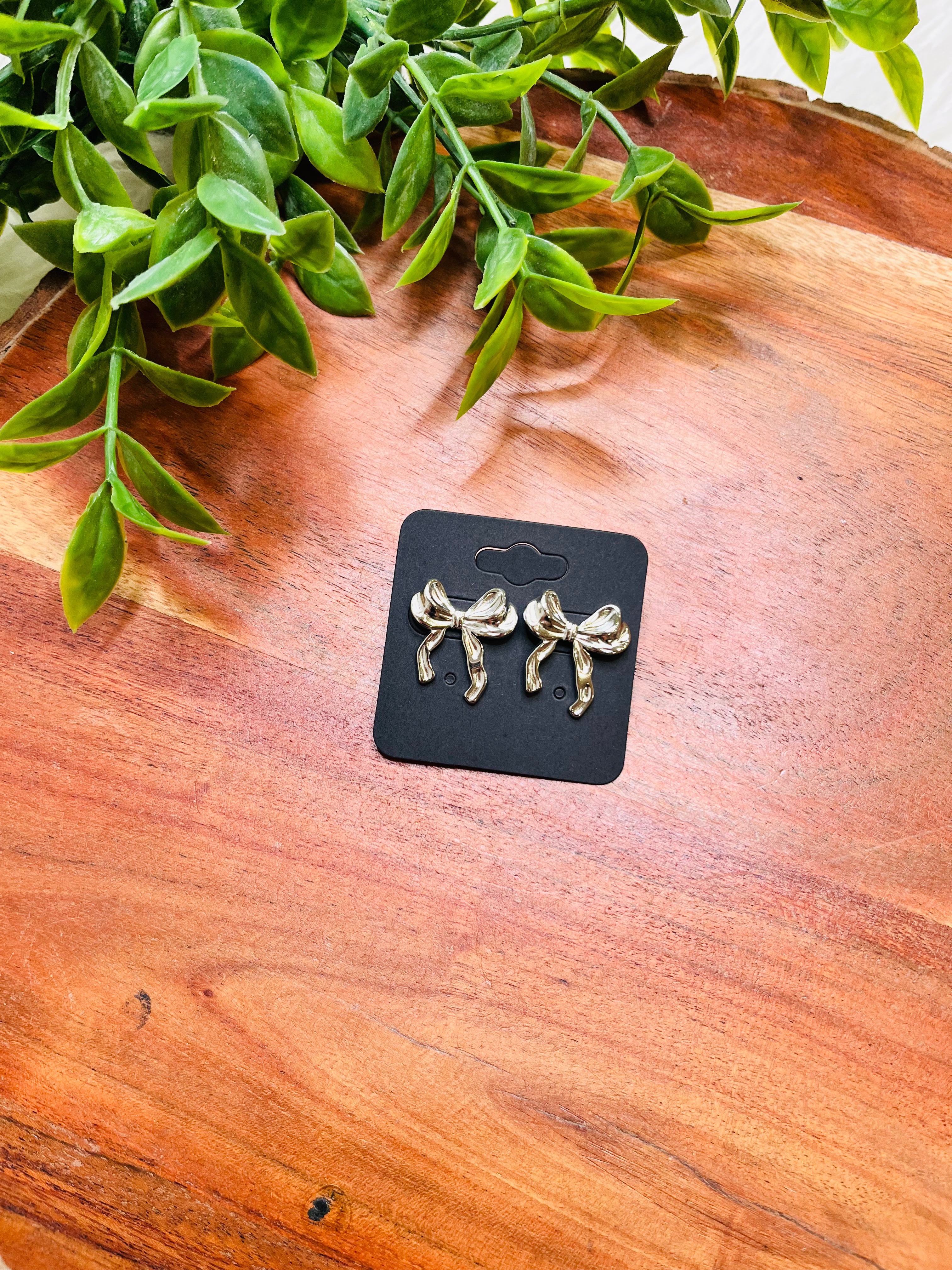 Women’s Silver Dipped Bow Earrings
