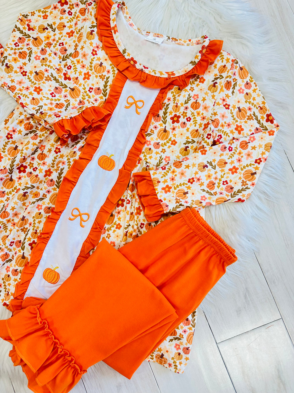 Girl’s Orange Floral Pumpkin Ruffle Pant Set