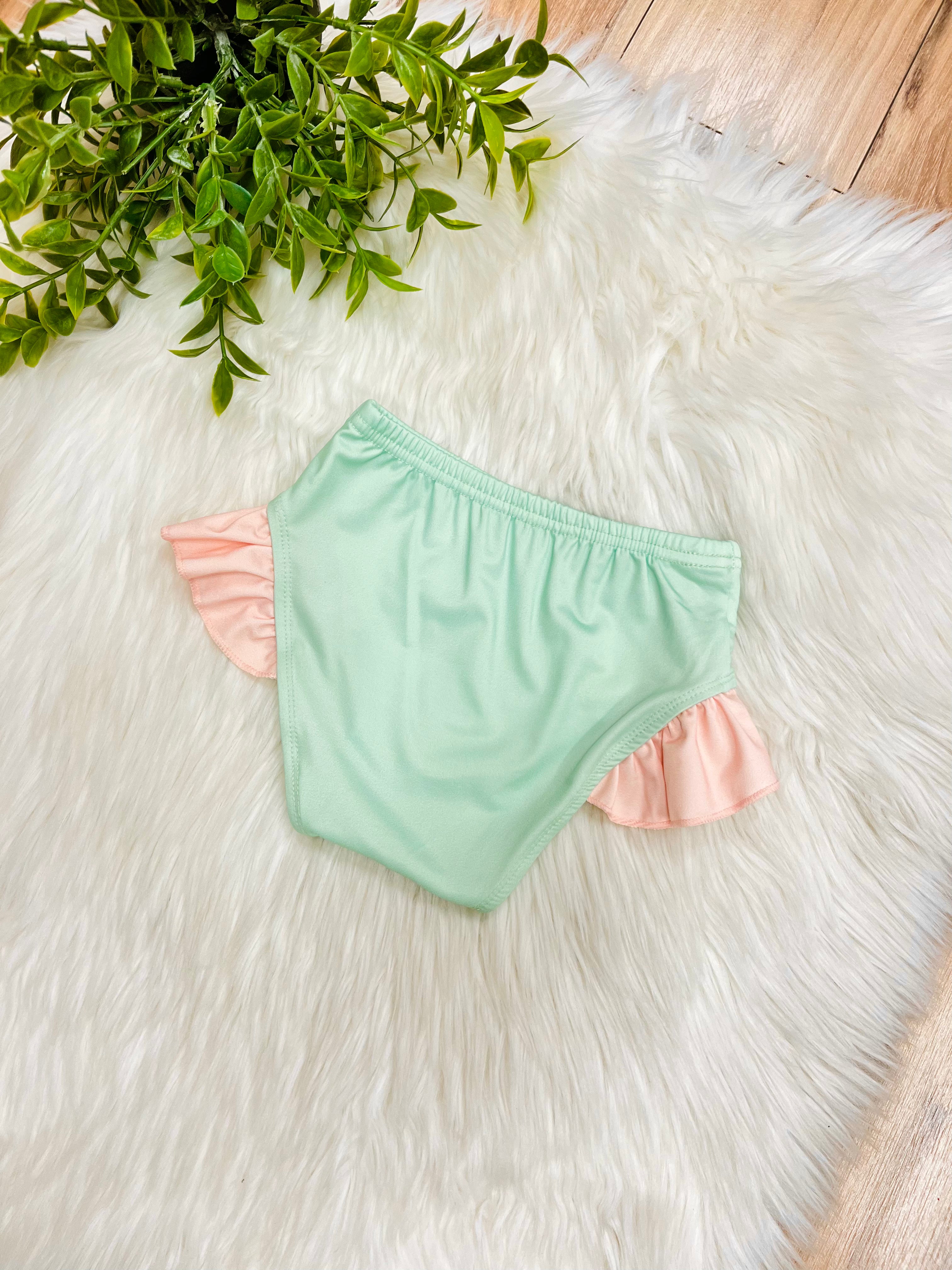 Girl’s Green Bathing Suit Bottoms with Peachy Pink Ruffle Trim
