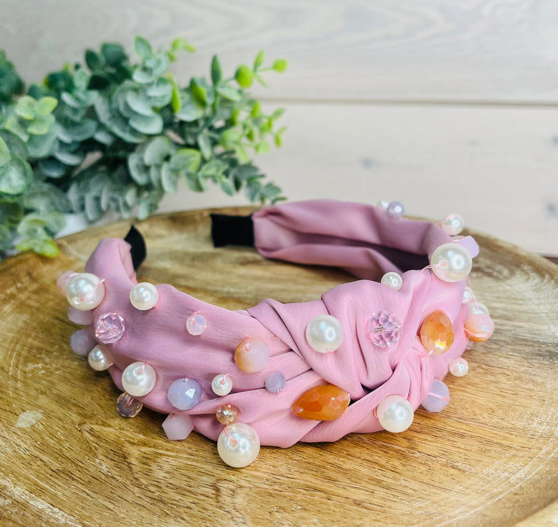 Pink headband with multi colored pearls
