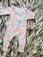 Girl’s Multi Color Floral Button Fly Romper