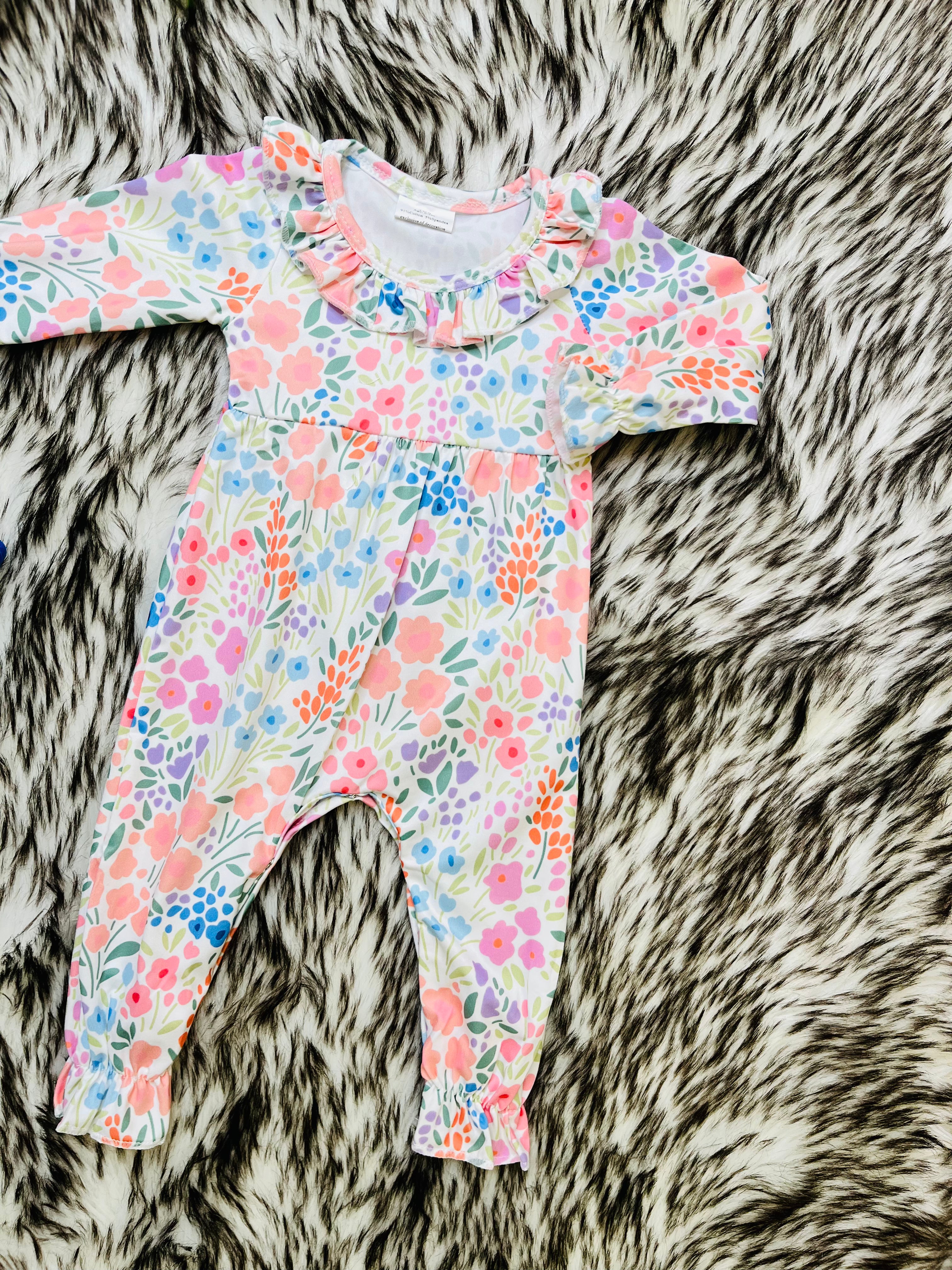 Girl’s Multi Color Floral Button Fly Romper