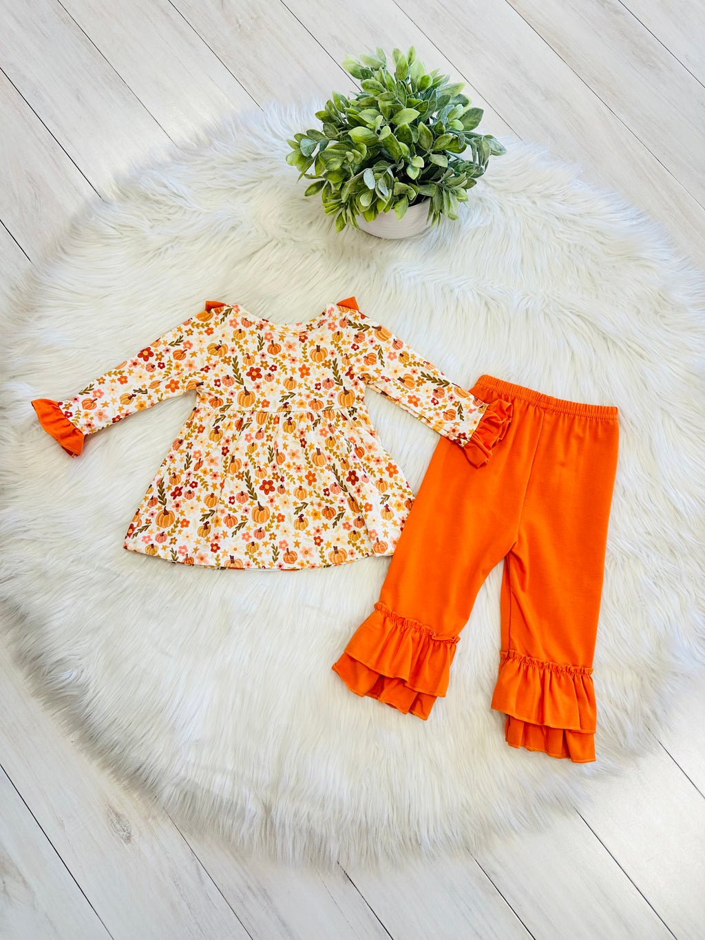 Girl’s Orange Floral Pumpkin Ruffle Pant Set