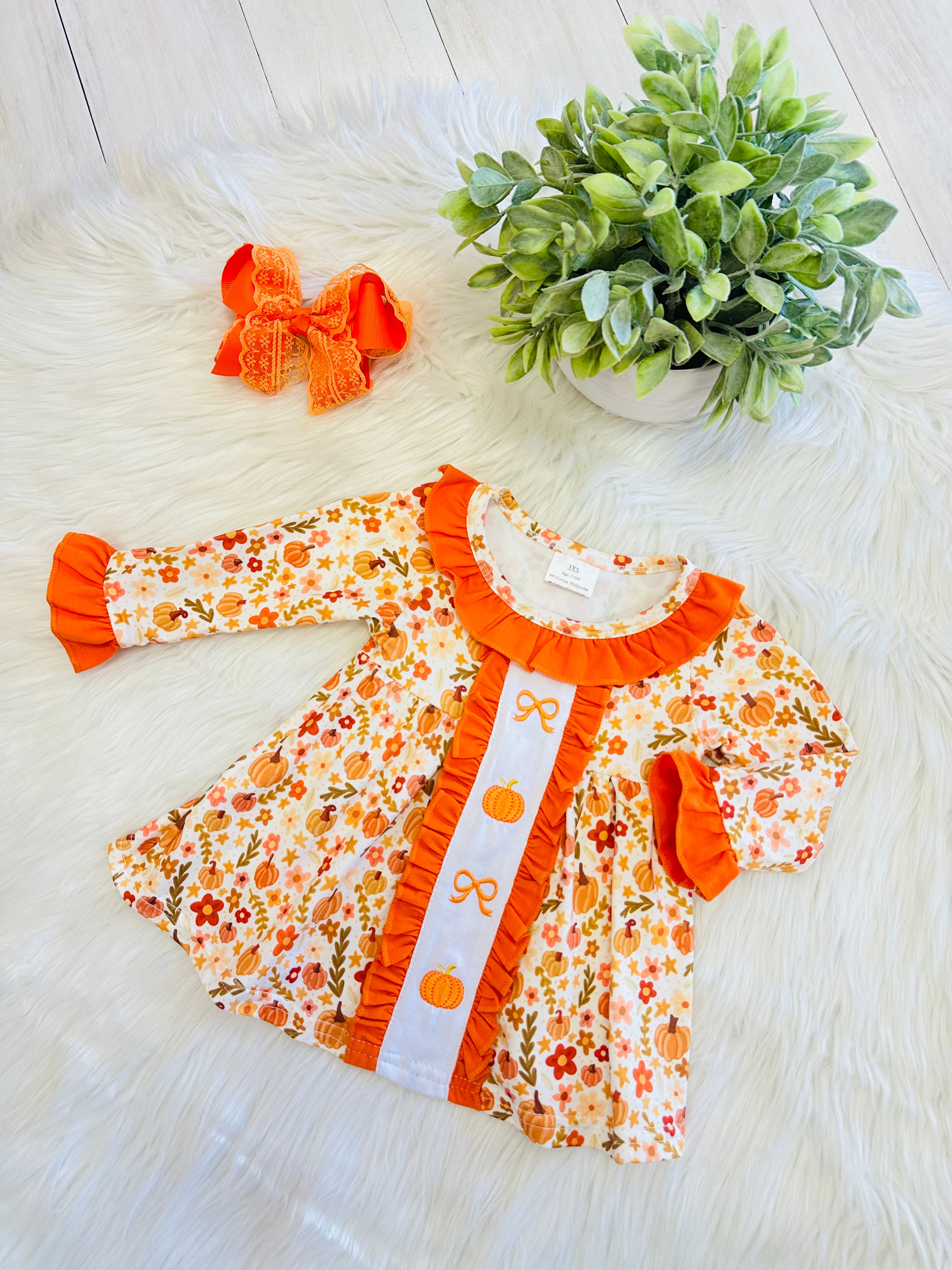 Girl’s Orange Floral Pumpkin Ruffle Pant Set