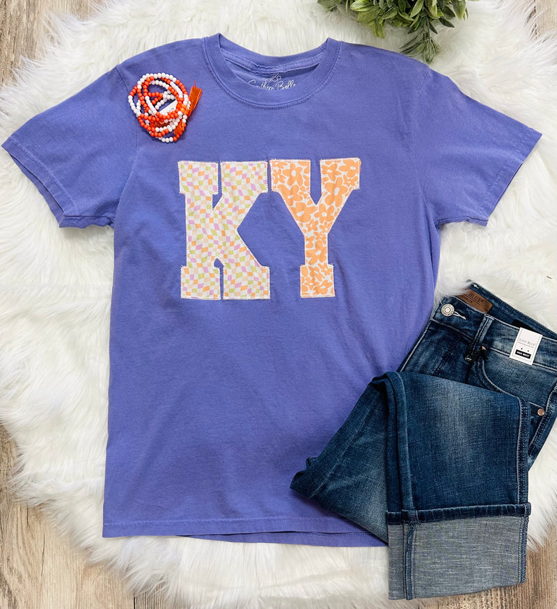 Women’s purple groovy KY tee