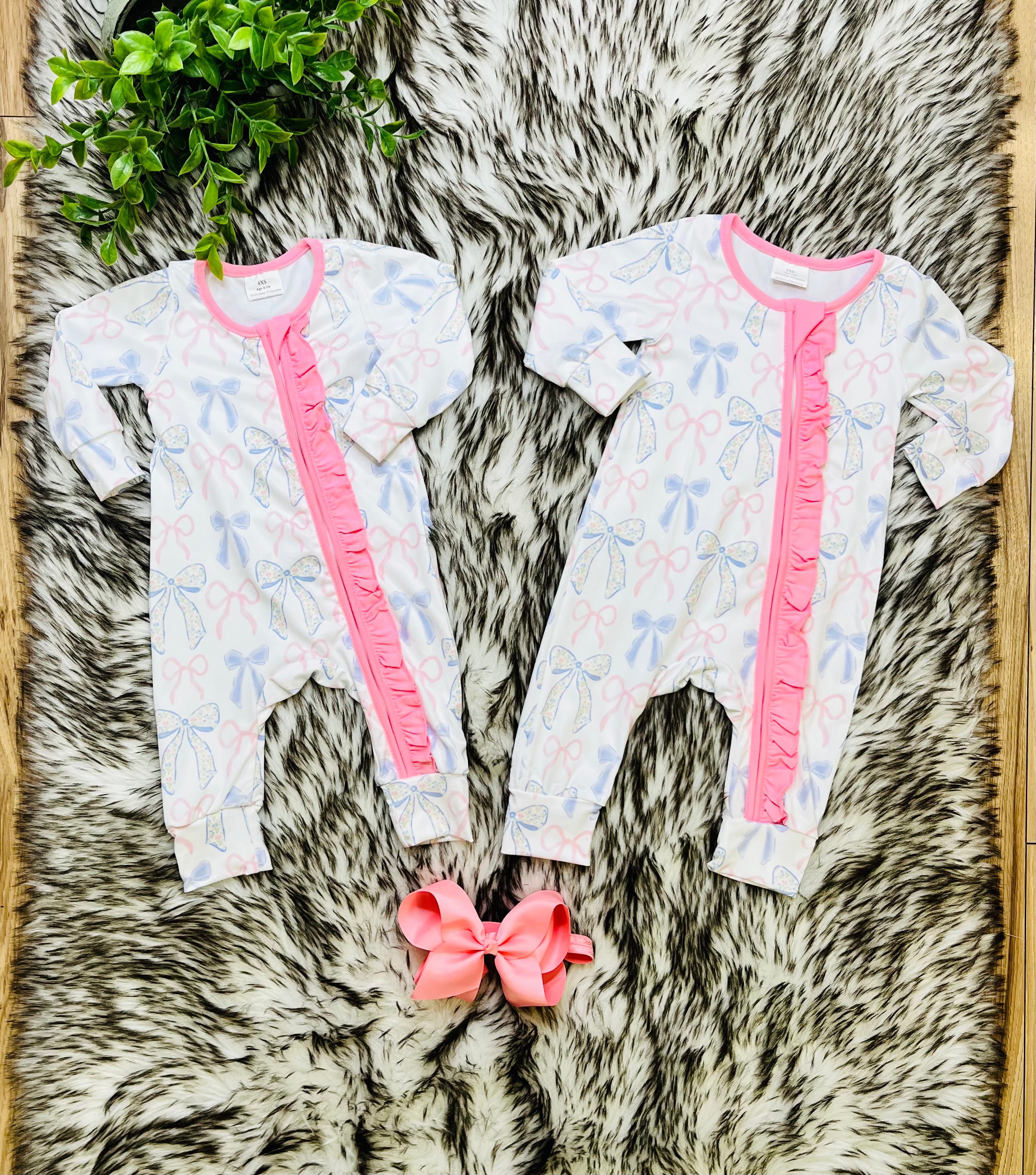 Girl’s Pink and Blue Bow Zipper Romper