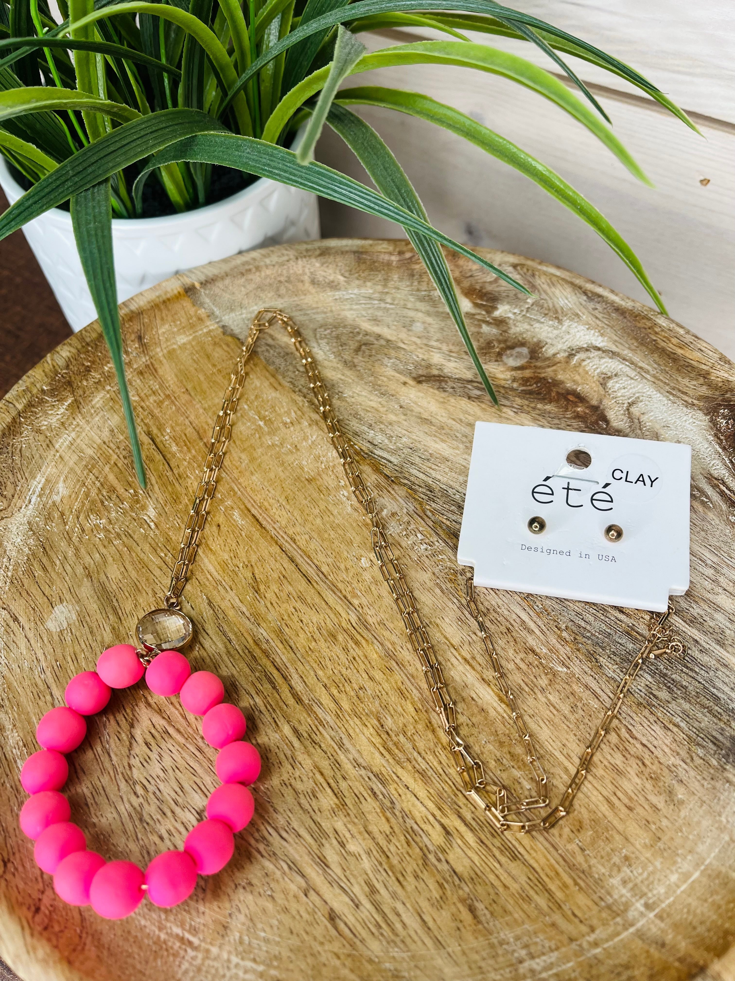 Pink oval bead necklace and gold studs women's