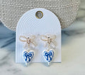 Women’s Blue and Gold Bow Earrings