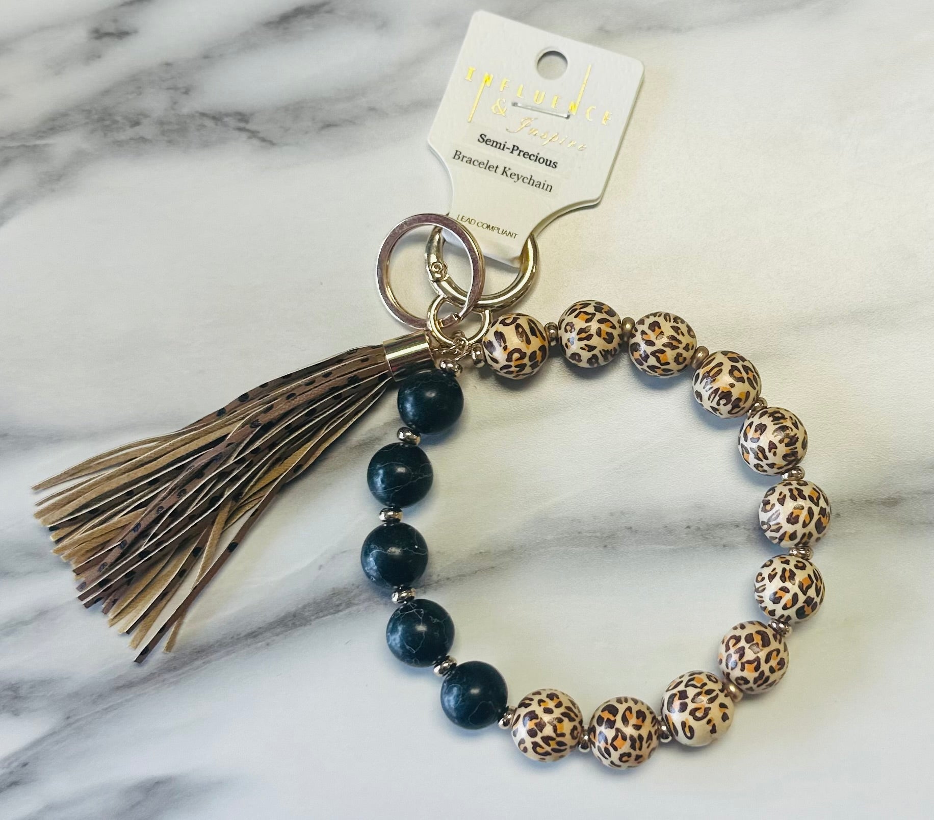 Women’s Cheetah Print And Marble Wristlet