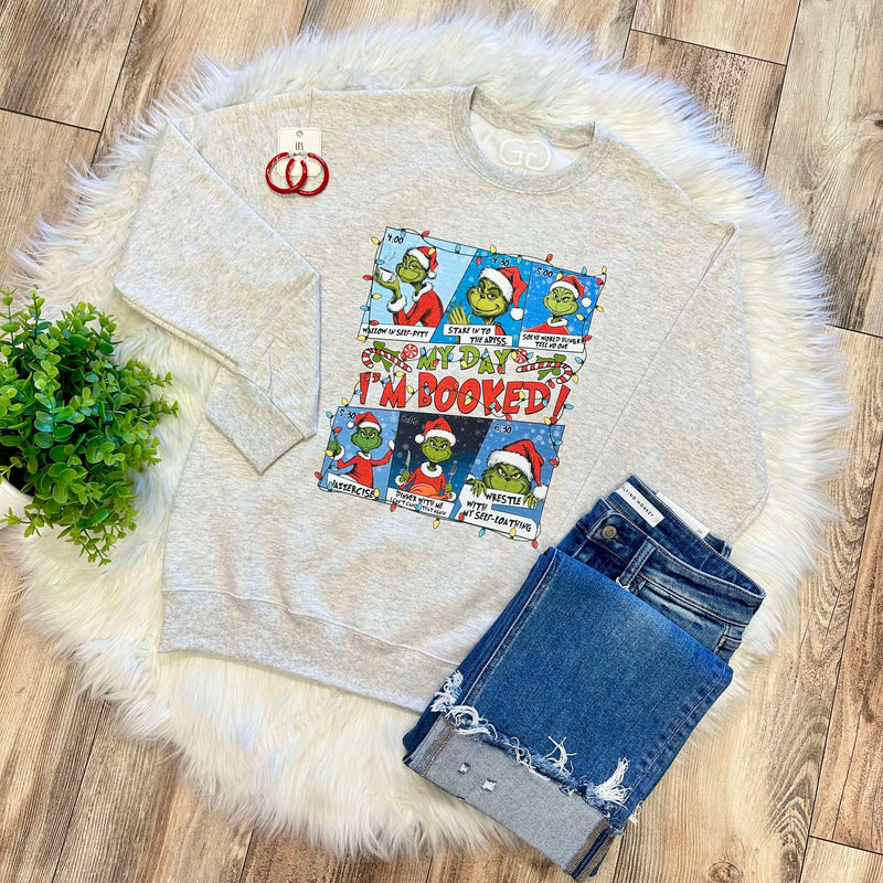 Women’s Grinch I’m Booked Christmas Crewneck Graphic Sweatshirt