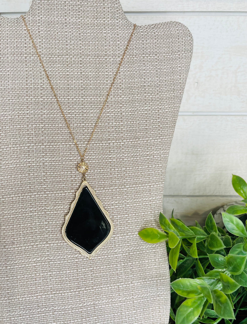 Women’s black pendant necklace