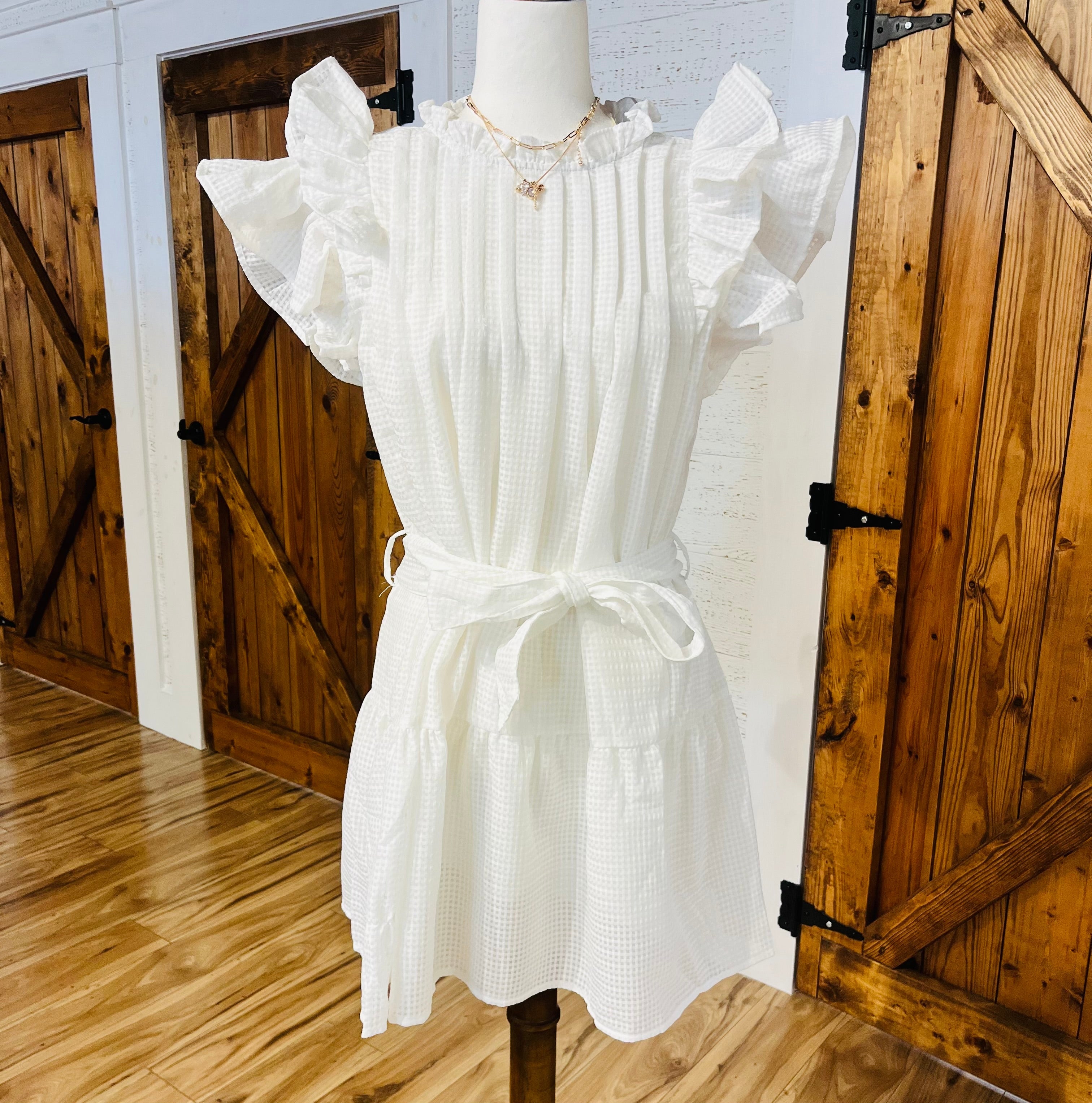 Women’s white textured ruffle dress