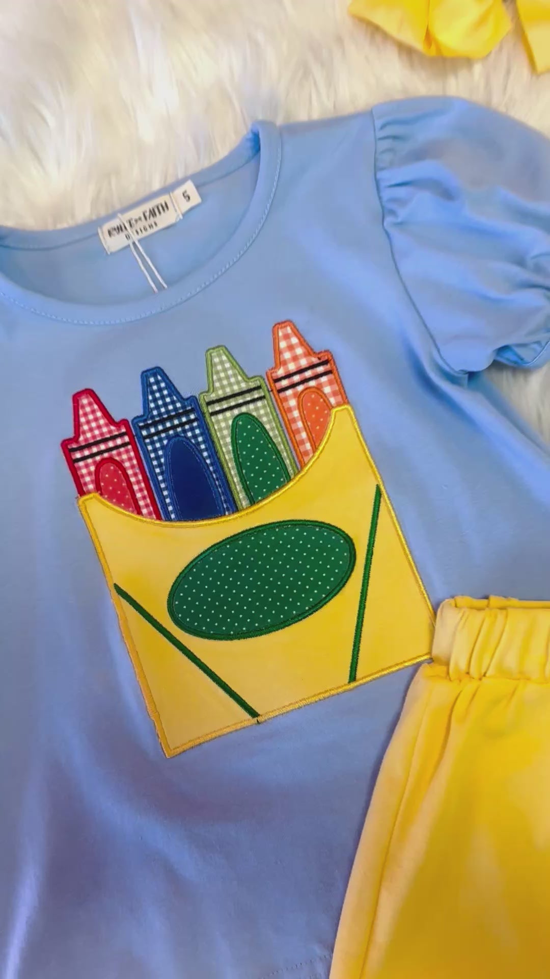 Girl’s blue and yellow crayon box set